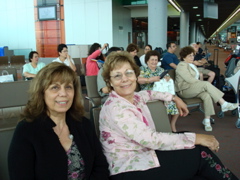Alma, Suad, and others waiting in the Paris airport (sy)