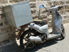 Motor scooters are very popular in Israel (rw)