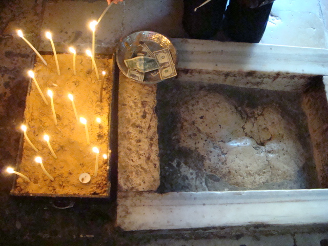 The revered rock in the Chapel of Christ's Ascension, Mount of Olives (sy)