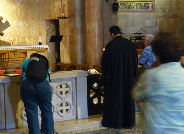 Ann, Father Samer, Fadi at the Rock of the Agony (rw)