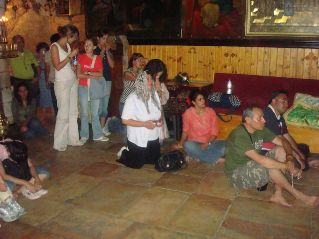 Reverence in the chapel of the Tomb of the Virgin Mary (sy)