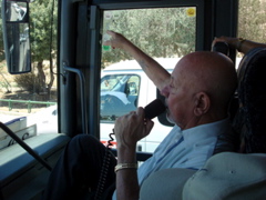 George the guide explaining things we passed while on the bus (sy)