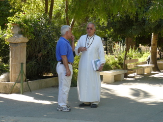Bill talking to one of the French White Fathers who take care of Bethesda Pools (rw)