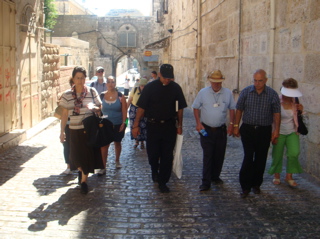 Walking up the Via Delarosa from Bethesda Pools - Minerva, Robert, Nicole, Ann, Father Samer, George the guide, Subi, Suad (hs)