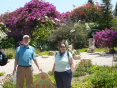 Ann and Robert with wonderful flowering trees in Latroun (rw)