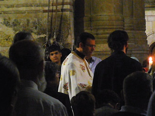 Father Samer reading the Gospel in Arabic at the Holy Sepulchre (rw)