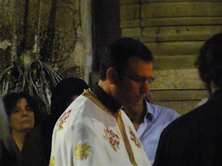 Father Samer reading the Gospel in Arabic at the Holy Sepulchre, closeup (rw)