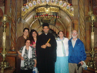 oum Fadi, Minerva, Hope, Father Samer, Ann, Robert in front of the Holy Sepulchre after midnight Liturgy, about 3:45am (sy)