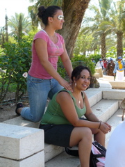 Ursula gives neck massage to Nichole after chicken fights in the pool (rw)