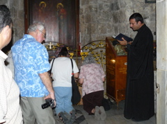 Praying at Church of Annunciation, Mary's Well, Nazareth (rw)