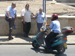Policemen and scooter, near Mary's well, Nazareth (rw)