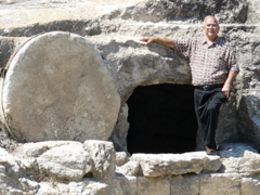 Subi at a tomb hewn in the rock, with a rolling stone to seal in, by the road on the Carmel, near Haifa (rw)