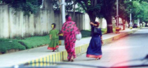 Mother and two daughters in saris