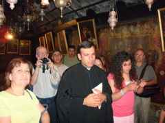 Praying in the Grotto of the Nativity - Rowida, Robert, Salim, David, Father Samer, Hope, George (sy)