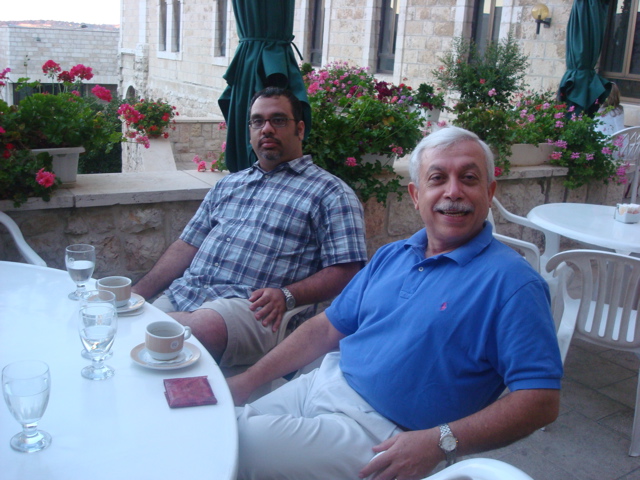 Karim and Bill relaxing on the patio at Notre Dame Jerusalem Center, after a busy day (sy)