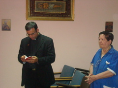Father Samer offers prayer at the Four Homes of Mercy in Bethany (sy)