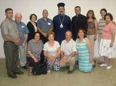 Group picture with the Bishop - Salim, Fuad, Hidad, Subi, oum Fadi, Suad, George, Rowida, Father Samer, Alma, Minerva, Rafiha (sy)