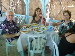 Fuad, Alma, and Suad at Al Rawdah Restaurant in Jericho (rw)