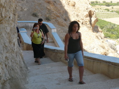 Nina, Father Samer, and Ursula climb to the Monastery of the Mount of Temptation (rw)