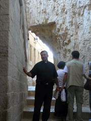 Father Samer in the Monastery passageway (rw)