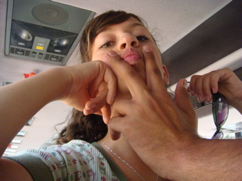 Natalia playing around in the bus (hs)
