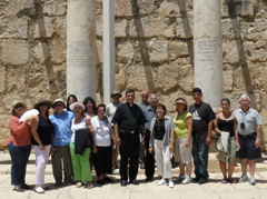 Group picture at the Synagogue of Capernaum - Ann, Alma, Fuad, Suad, Minerva, Hope, oum Fadi, Salim, Father Samer, George, Subi, Widad, Rowida, Paul, Nicole, Bill (rw)