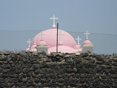 Pink dome and crosses of Greek Orthodox church in Capernaum (rw)